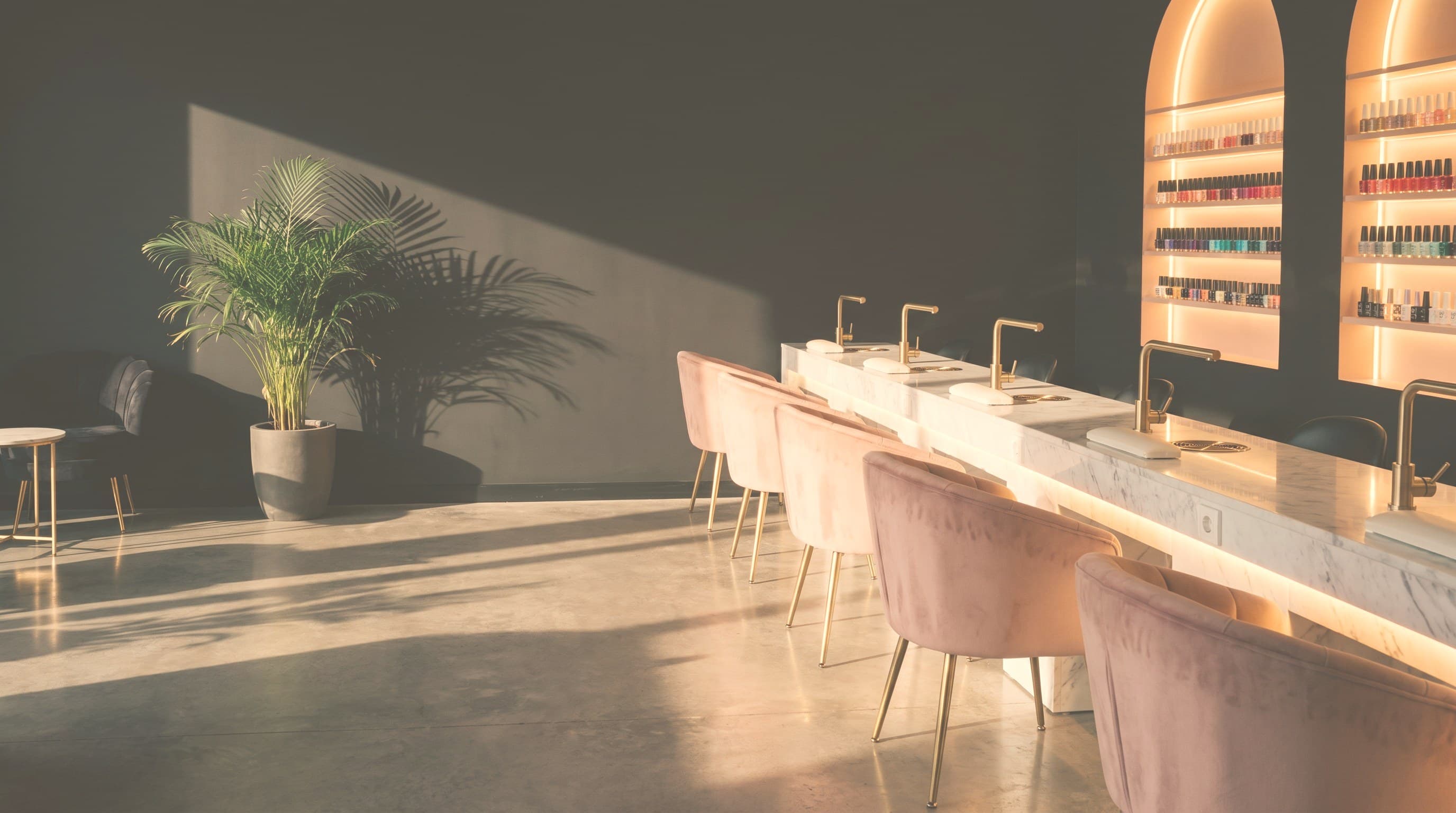 The Stefanny Nails salon interior in charcoal, gold and blush